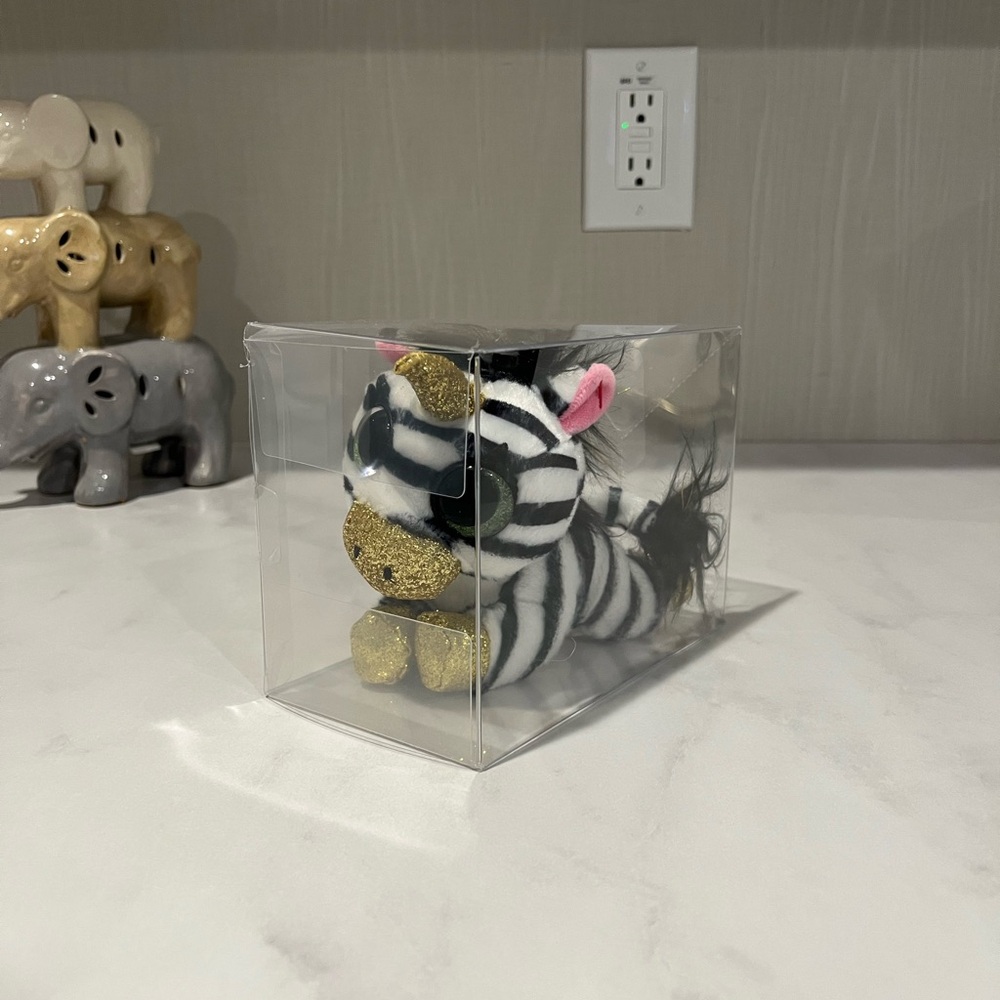 Beanie baby Coco Zebra comes with pencil